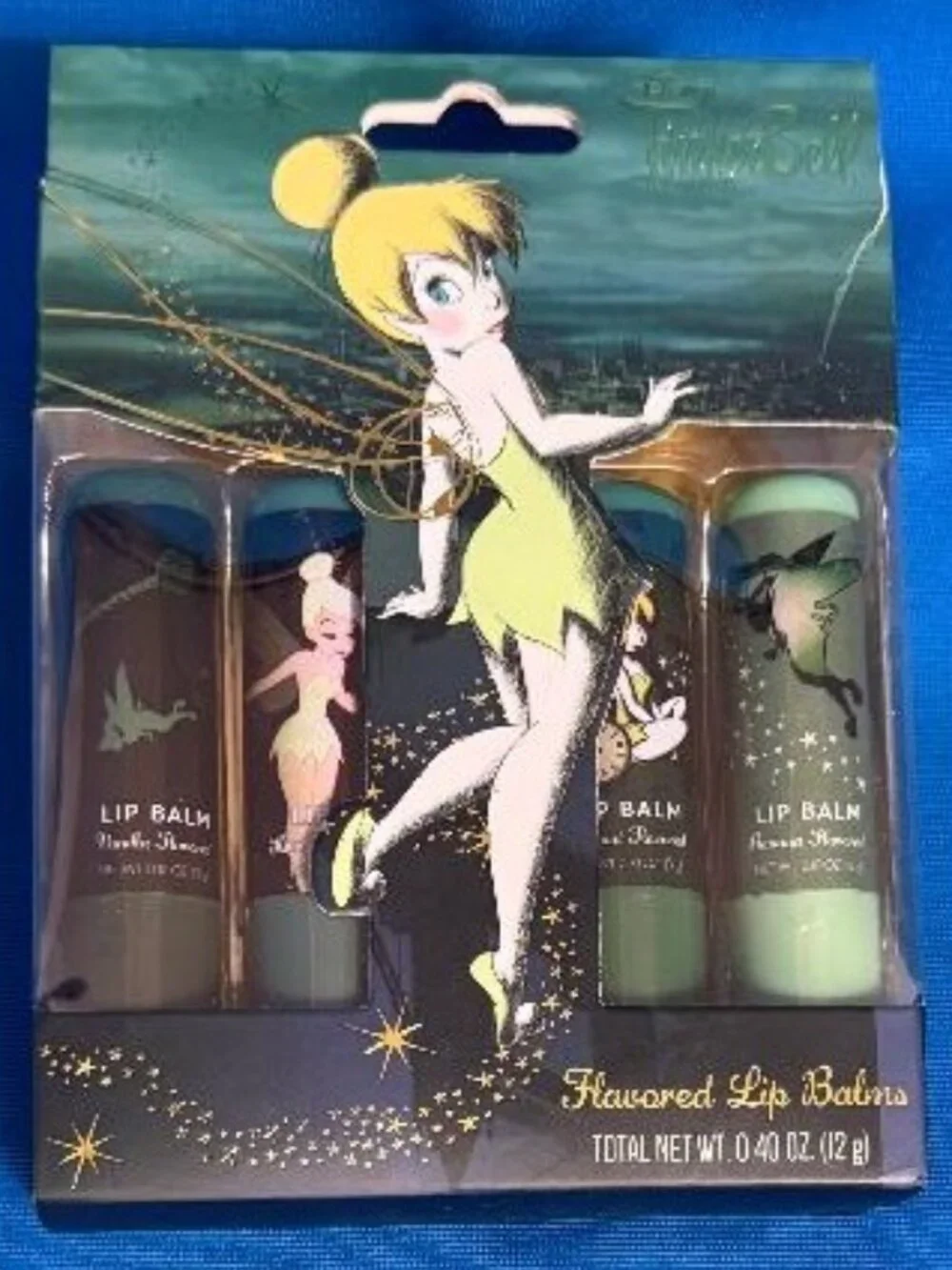 DISNEY TINKER BELL 4 PACK FLAVORED LIP BALMS VANILLA BANANA COCONUT & KIWI MELON